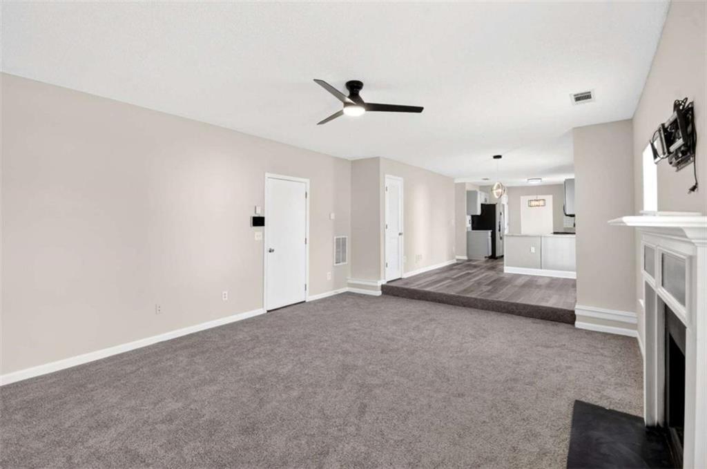 1727 Rice Square Lithonia, GA 30058 - Photo 10 of 33 a view of livingroom and fireplace