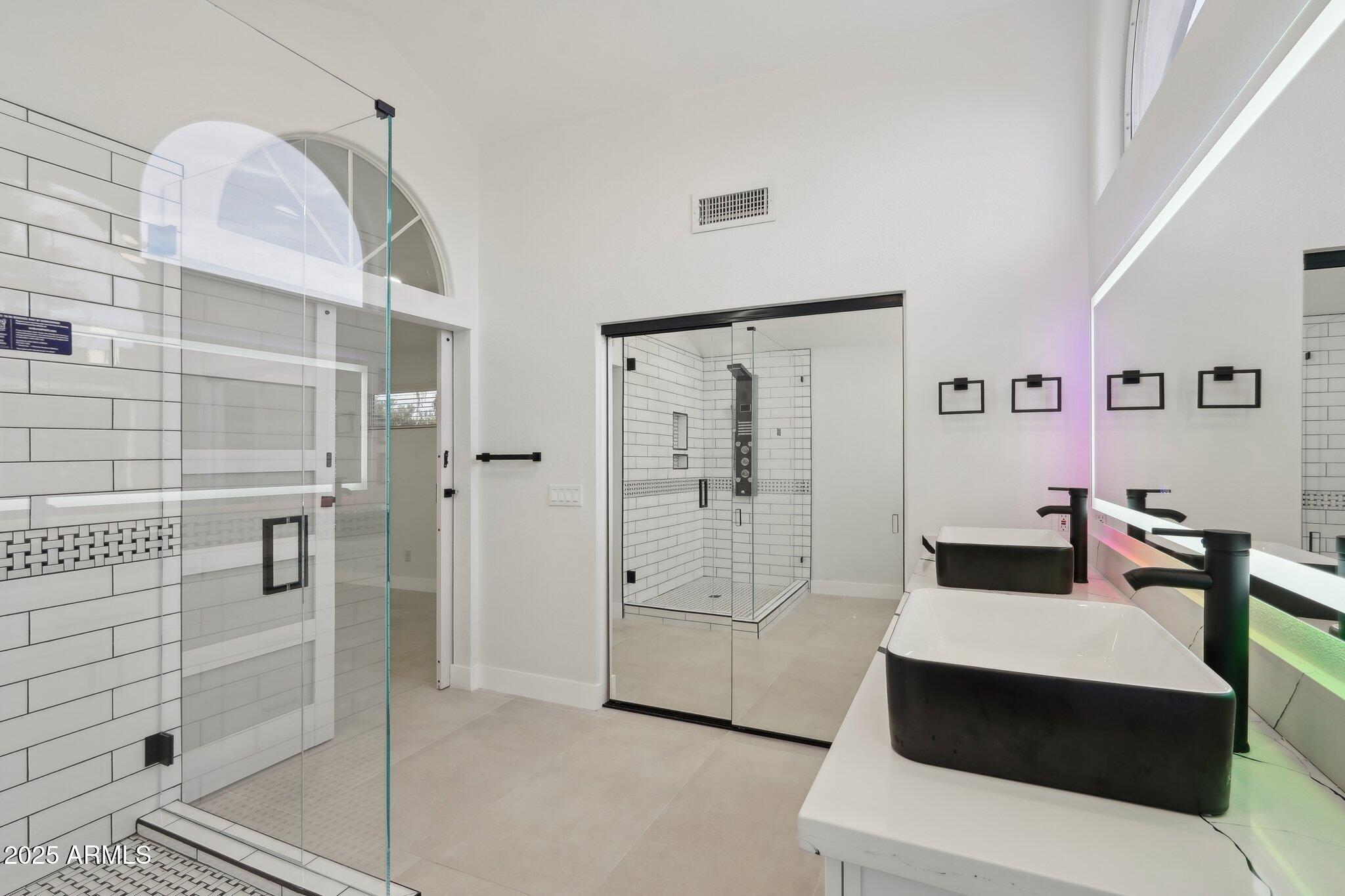 5704 East Estrid Avenue Scottsdale, AZ 85254 - Photo 17 of 48 a bedroom with a bed and a window