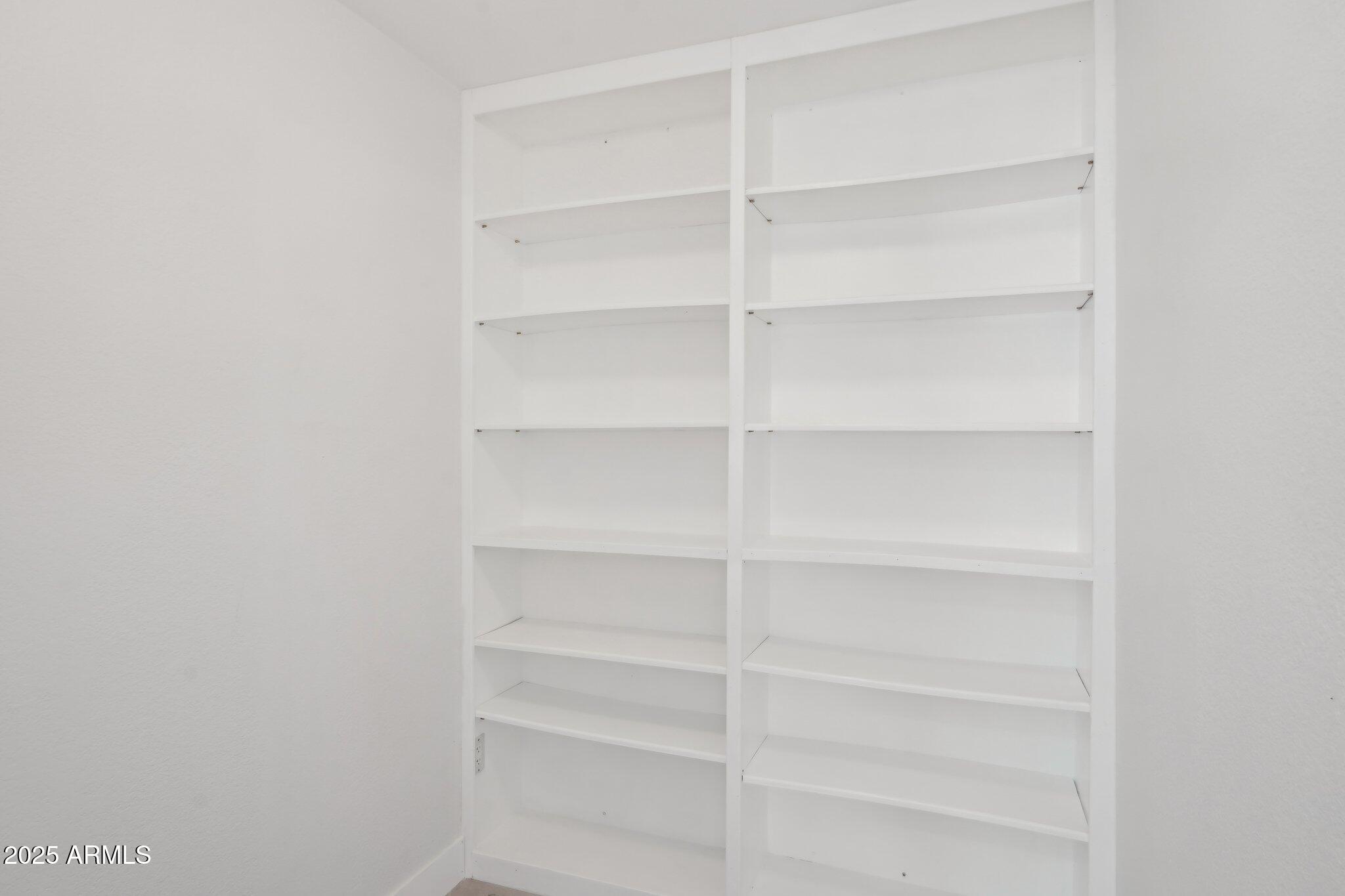 5704 East Estrid Avenue Scottsdale, AZ 85254 - Photo 27 of 48 a view of a room with shelf