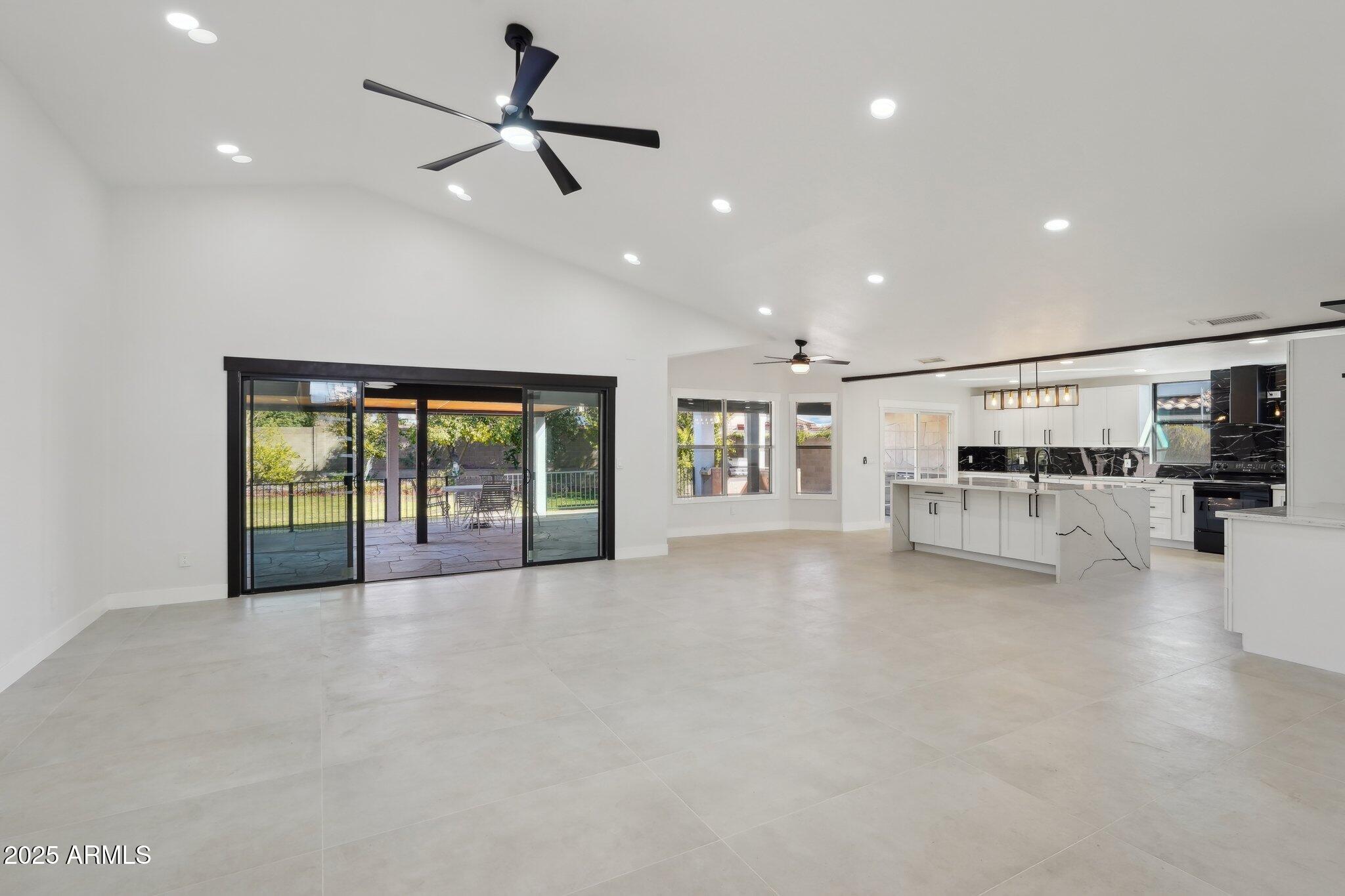 5704 East Estrid Avenue Scottsdale, AZ 85254 - Photo 4 of 48 a view of an empty room with a window