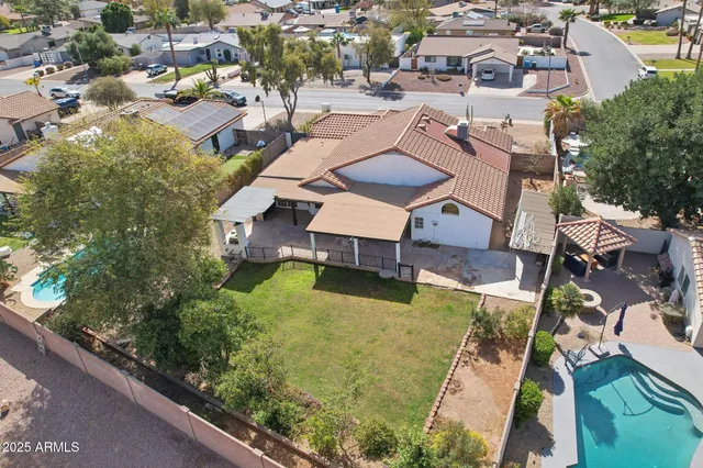 an aerial view of residential building and street