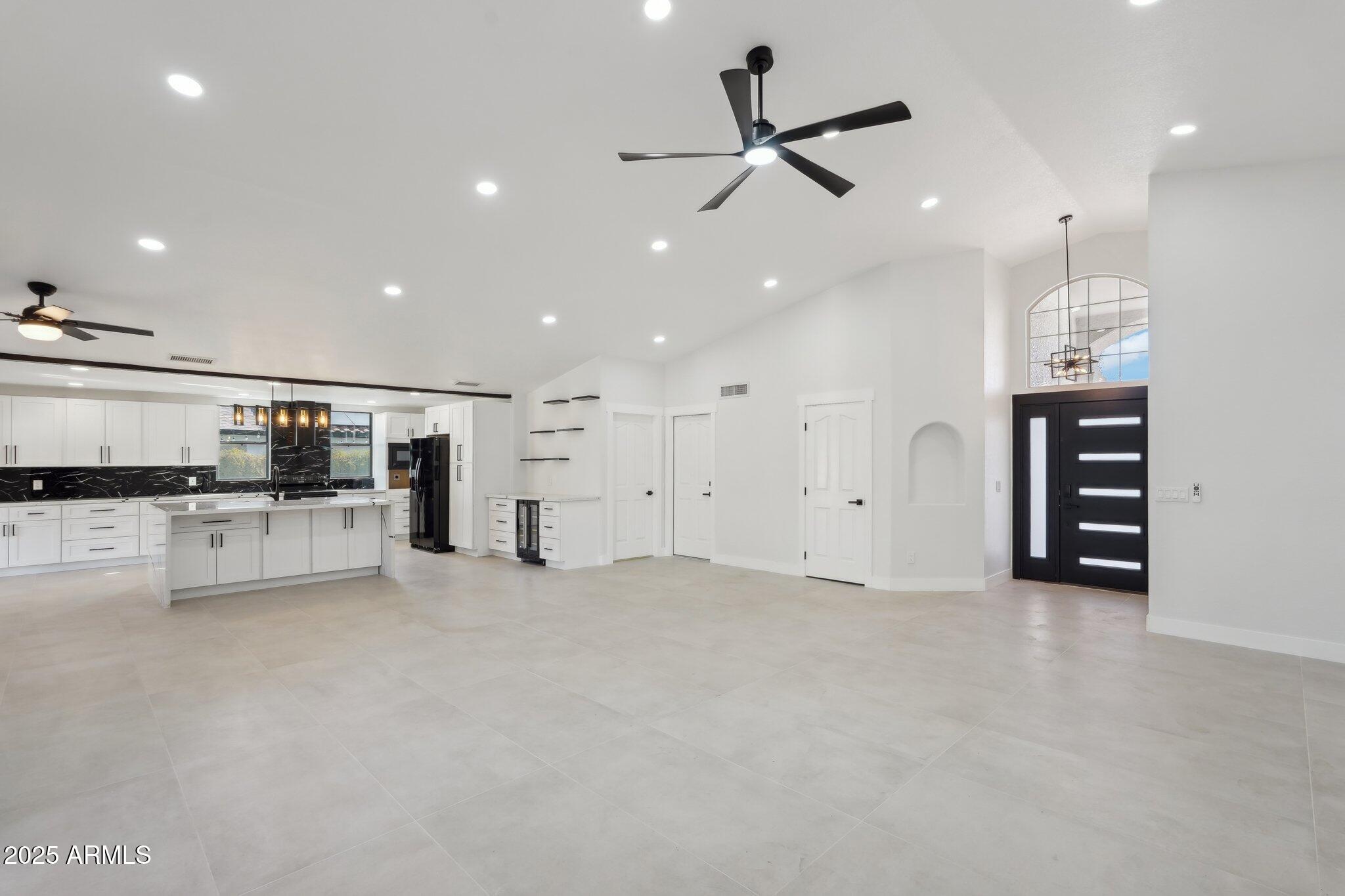 5704 East Estrid Avenue Scottsdale, AZ 85254 - Photo 5 of 48 a view of kitchen with stainless steel appliances kitchen island refrigerator stove and oven