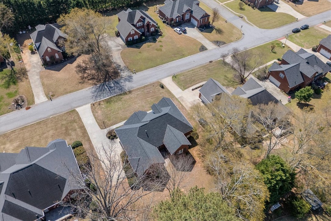 128 Cayman Way Anderson, SC 29621 - Photo 43 of 49 An aerial view captures the neighborhood with several charming homes and ample green space.