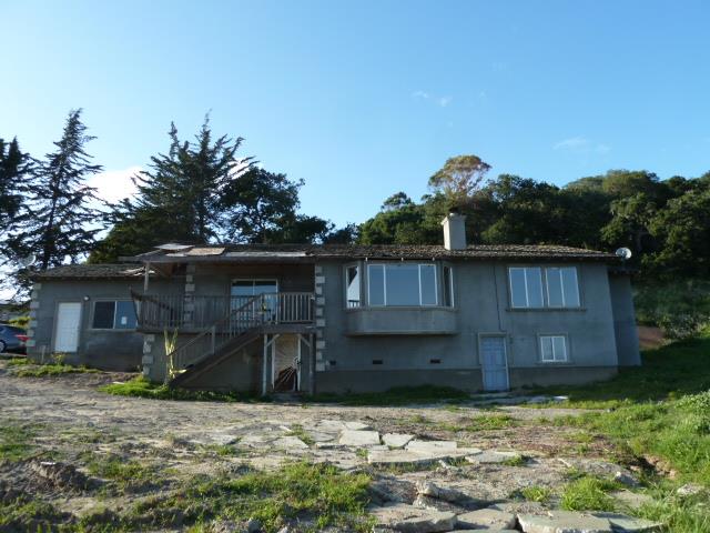 77 Overpass Road, Unit B Watsonville, CA 95076 - Photo 1 of 10 a backyard of a house with lots of green space