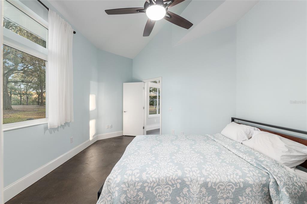 6012 168th Street Alachua, FL 32615 - Photo 35 of 48 a bedroom with a bed and window