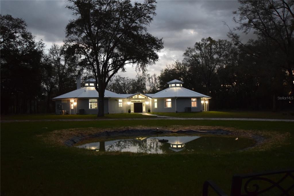 6012 168th Street Alachua, FL 32615 - Photo 45 of 48 a view of a house with a yard