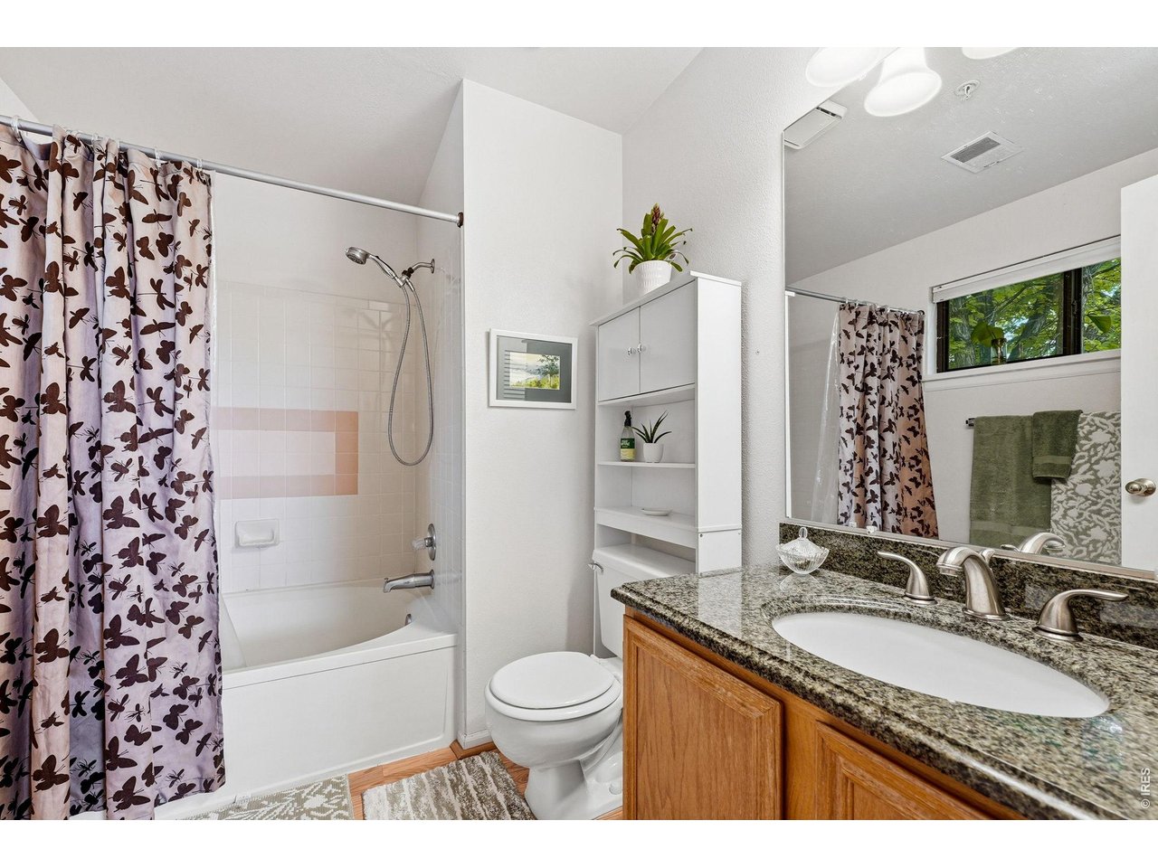 4985 Twin Lakes Road, Unit 94 Boulder, CO 80301 - Photo 12 of 29 The en-suite primary bathroom includes a soaking tub with shower.