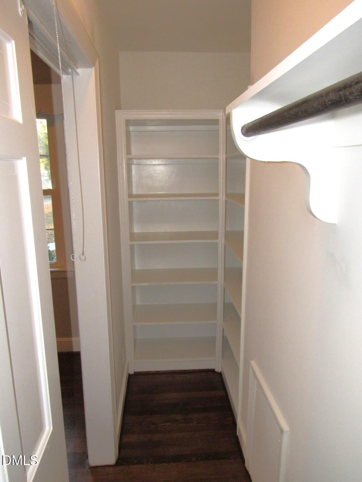 600 North 18th Street Butner, NC 27509 - Photo 26 of 56 a view of walk in closet with empty racks