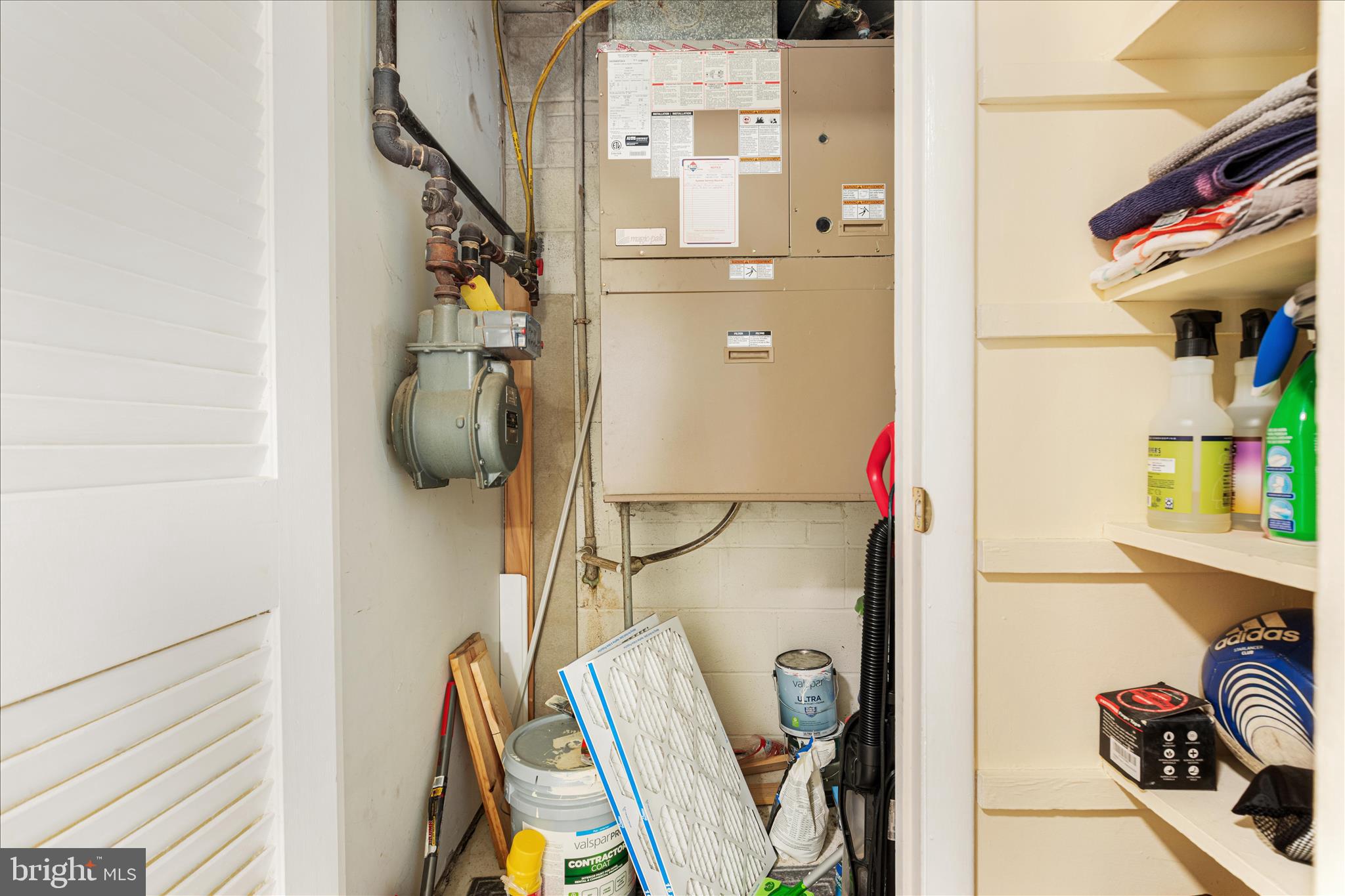 125 Clubhouse Drive Southwest, Unit 1 Leesburg, VA 20175 - Photo 16 of 17 a view of walk in closet with clothes and shoes