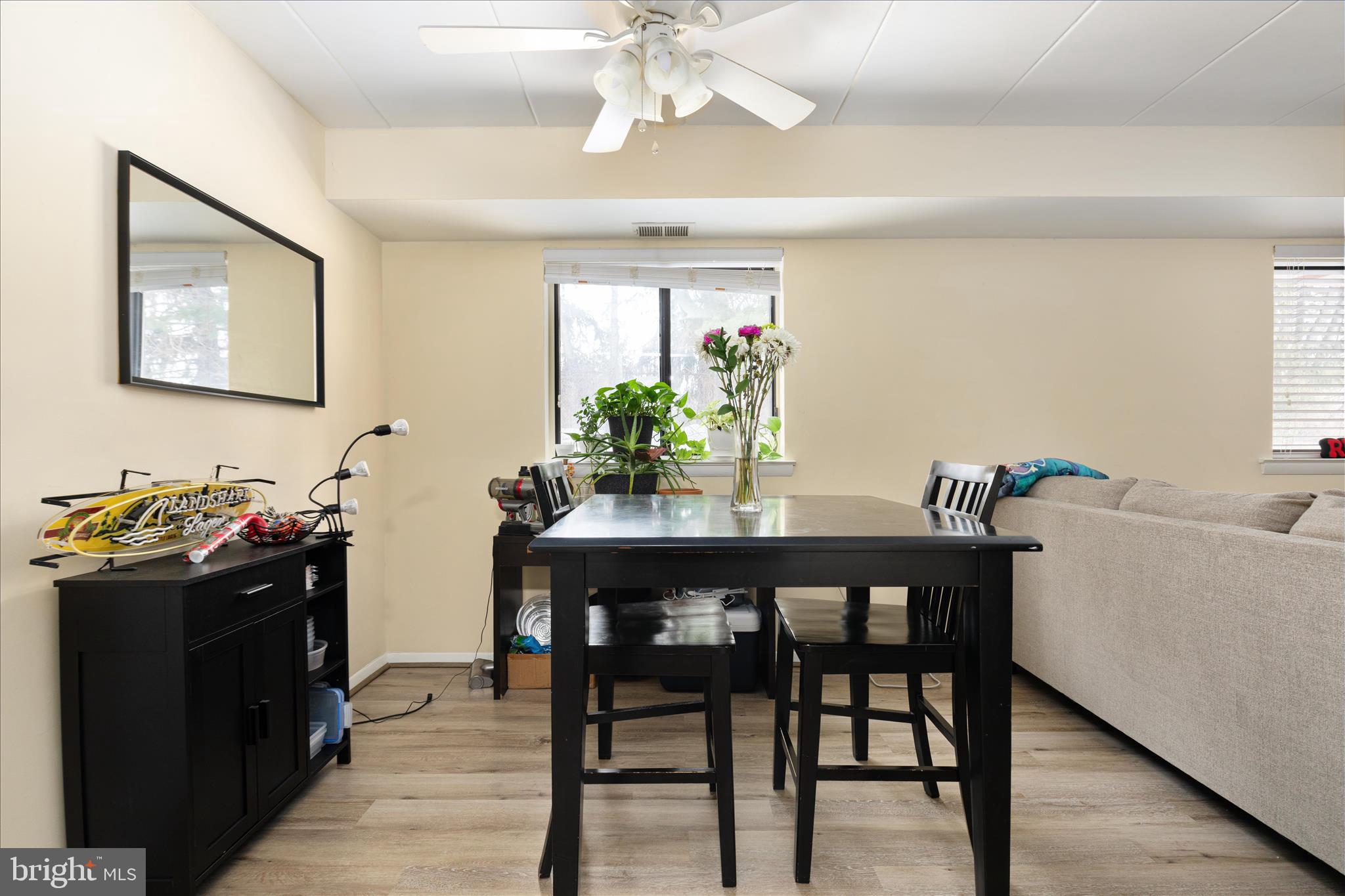 125 Clubhouse Drive Southwest, Unit 1 Leesburg, VA 20175 - Photo 8 of 17 a dining room with furniture and window