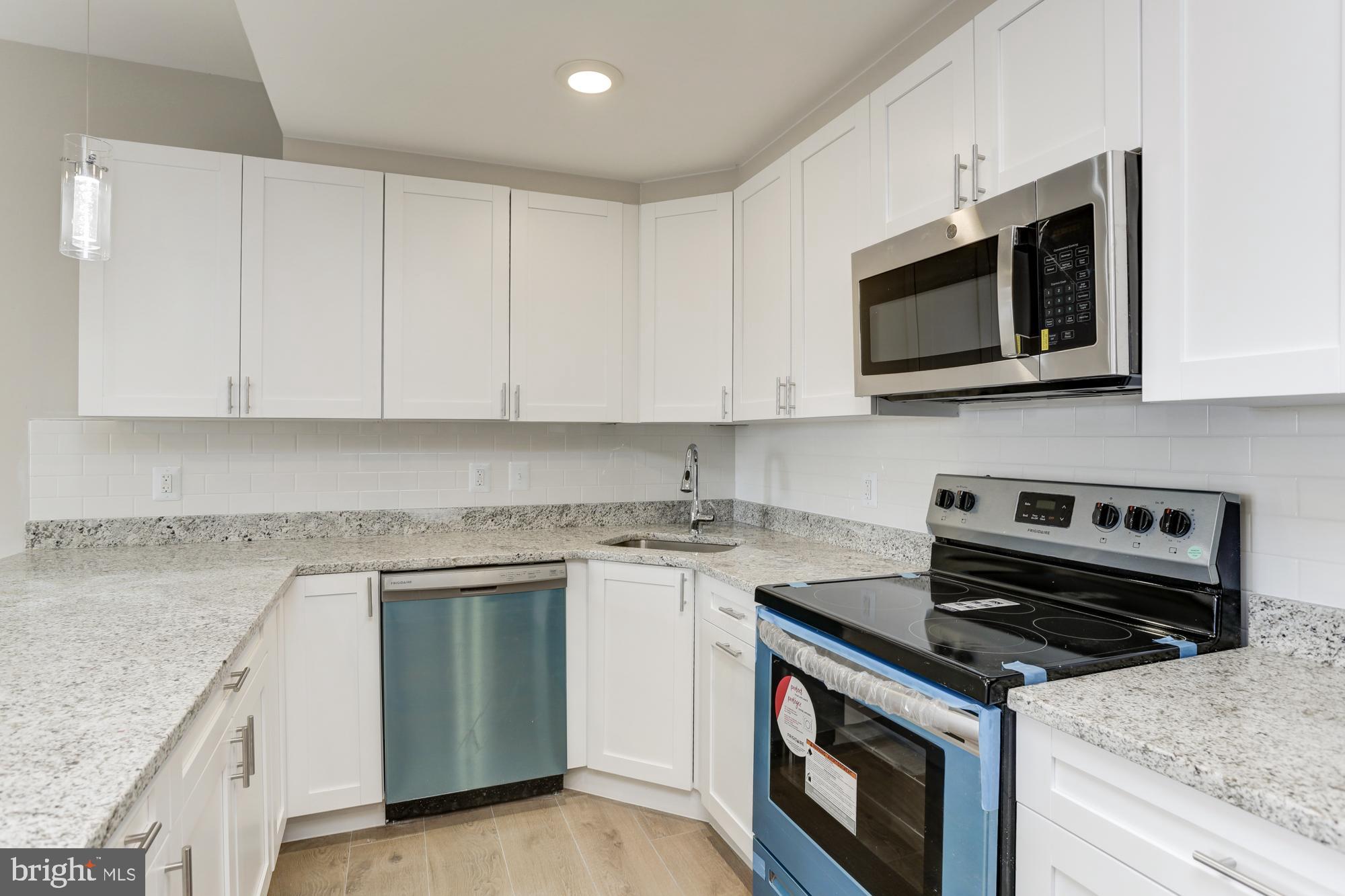 1923 Ashland Avenue, Unit 401 Baltimore, MD 21205 - Photo 7 of 19 SS appliances