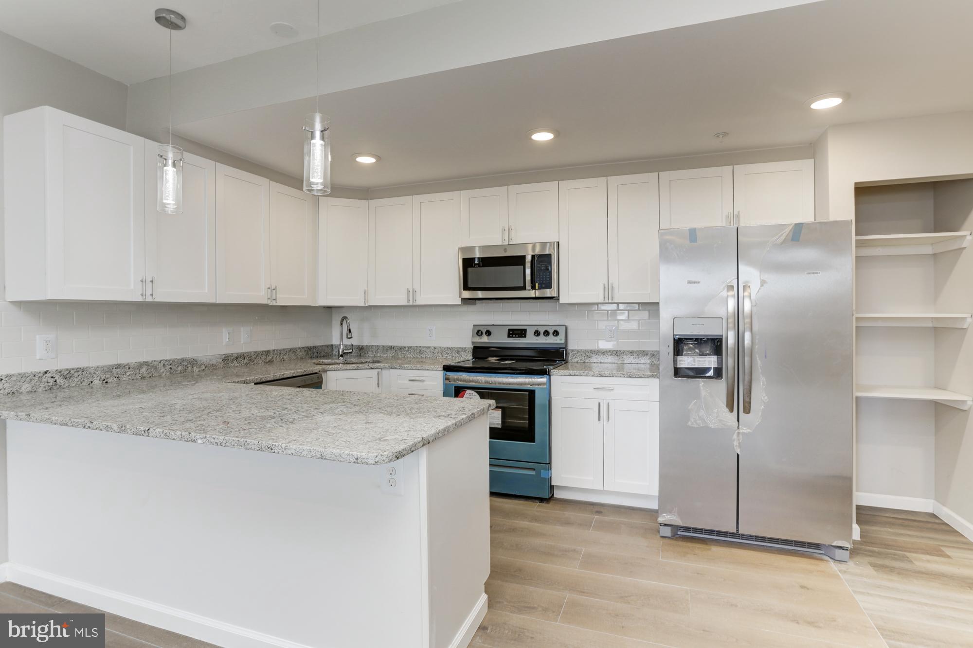 1923 Ashland Avenue, Unit 401 Baltimore, MD 21205 - Photo 9 of 19 Gourmet kitchen