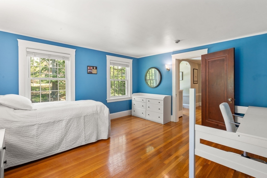 513 Chestnut Street Newton, MA 02468 - Photo 15 of 32 a bed room with a bed and window