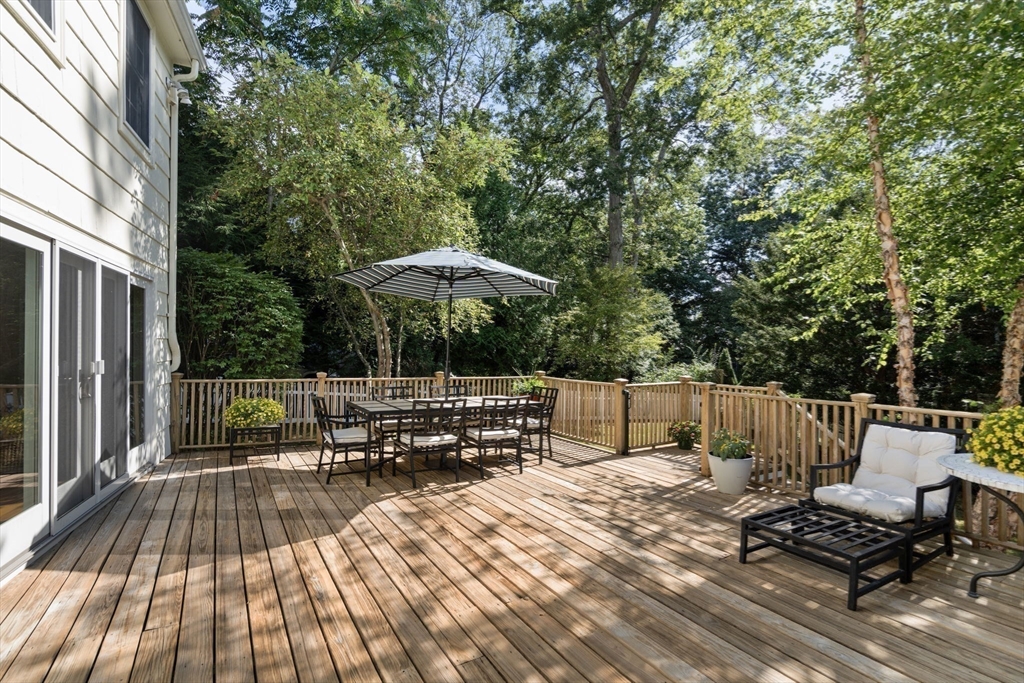 513 Chestnut Street Newton, MA 02468 - Photo 24 of 32 a view of backyard with seating area and trees