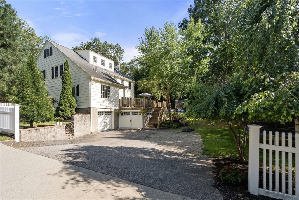 513 Chestnut Street Newton, MA 02468 - Photo 25 of 32 a white house that has tree in front of it