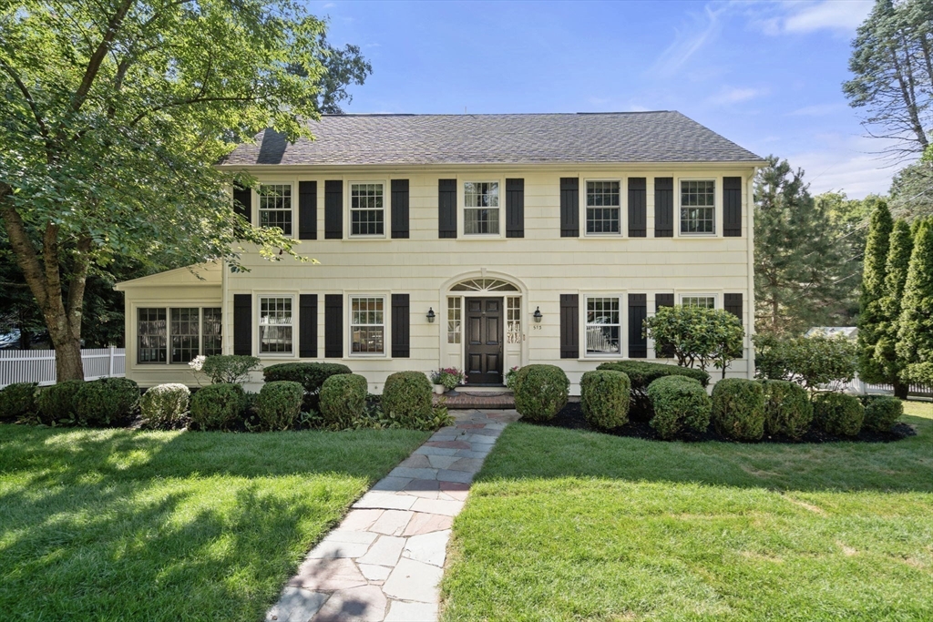 513 Chestnut Street Newton, MA 02468 - Photo 26 of 32 a front view of a house with a yard