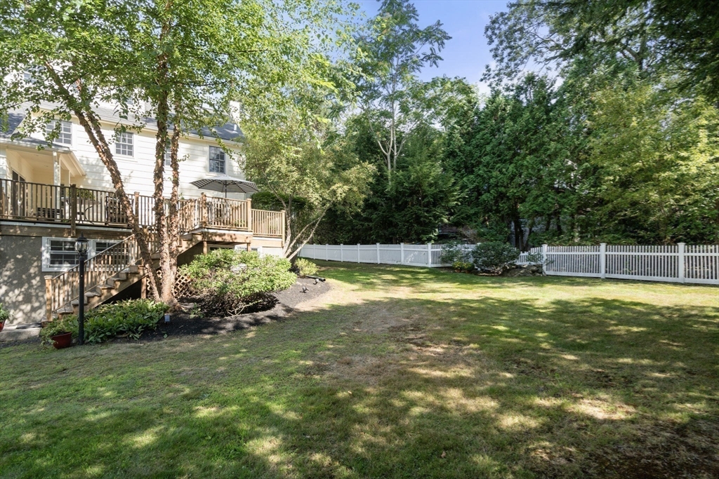 513 Chestnut Street Newton, MA 02468 - Photo 29 of 32 a view of a house with a backyard