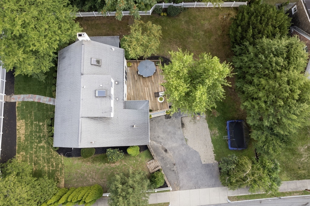 513 Chestnut Street Newton, MA 02468 - Photo 31 of 32 an aerial view of a house with a yard basket ball court and outdoor seating