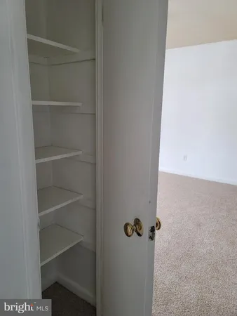 a view of a room with rack on the wall