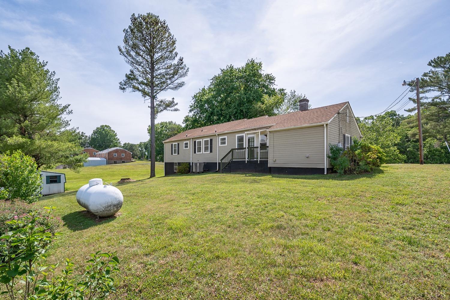 4794 Salem Road Spout Spring, VA 24593 - Photo 26 of 34 a view of a backyard with a trampoline