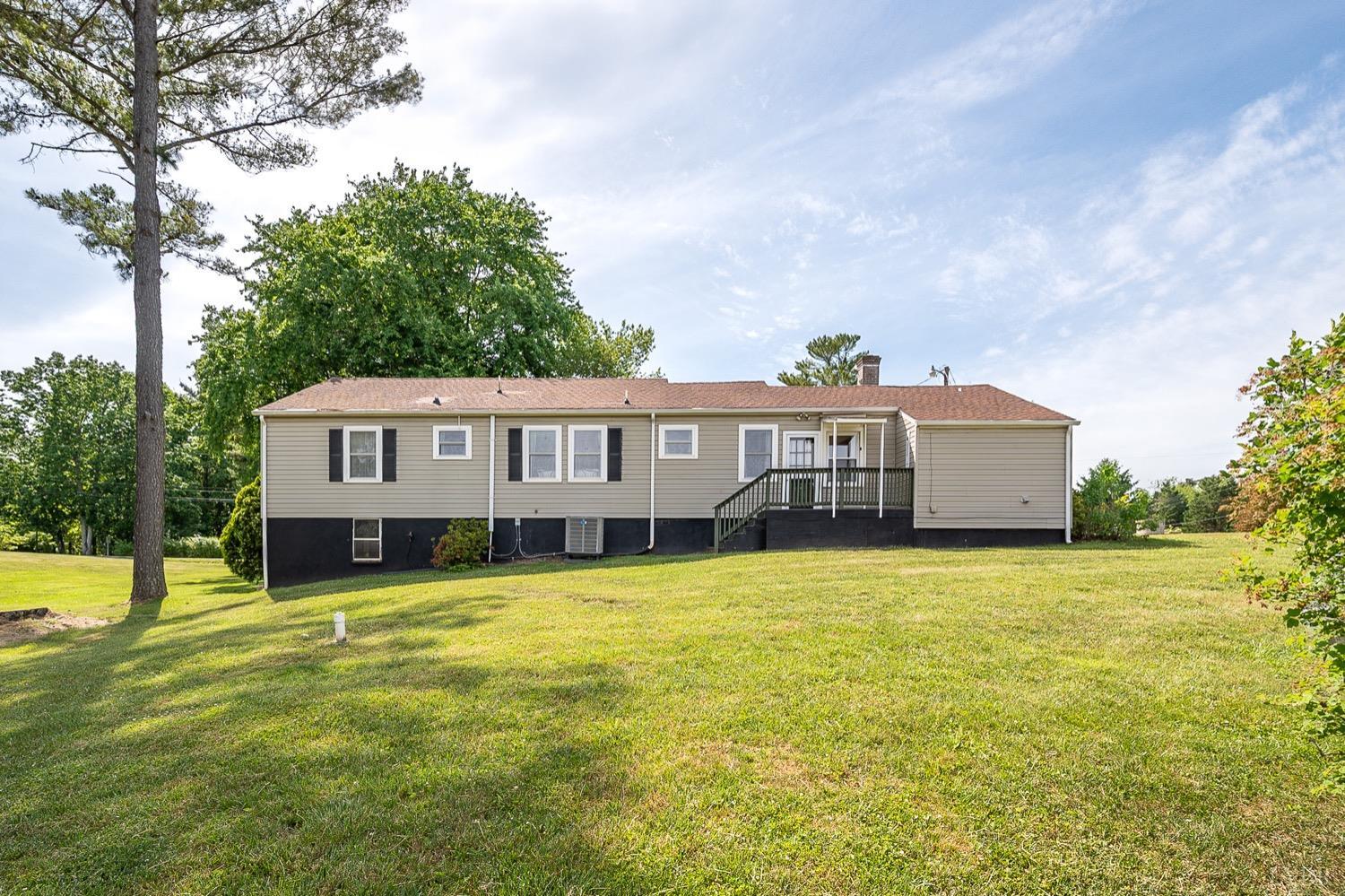 4794 Salem Road Spout Spring, VA 24593 - Photo 27 of 34 a front view of a house with a yard