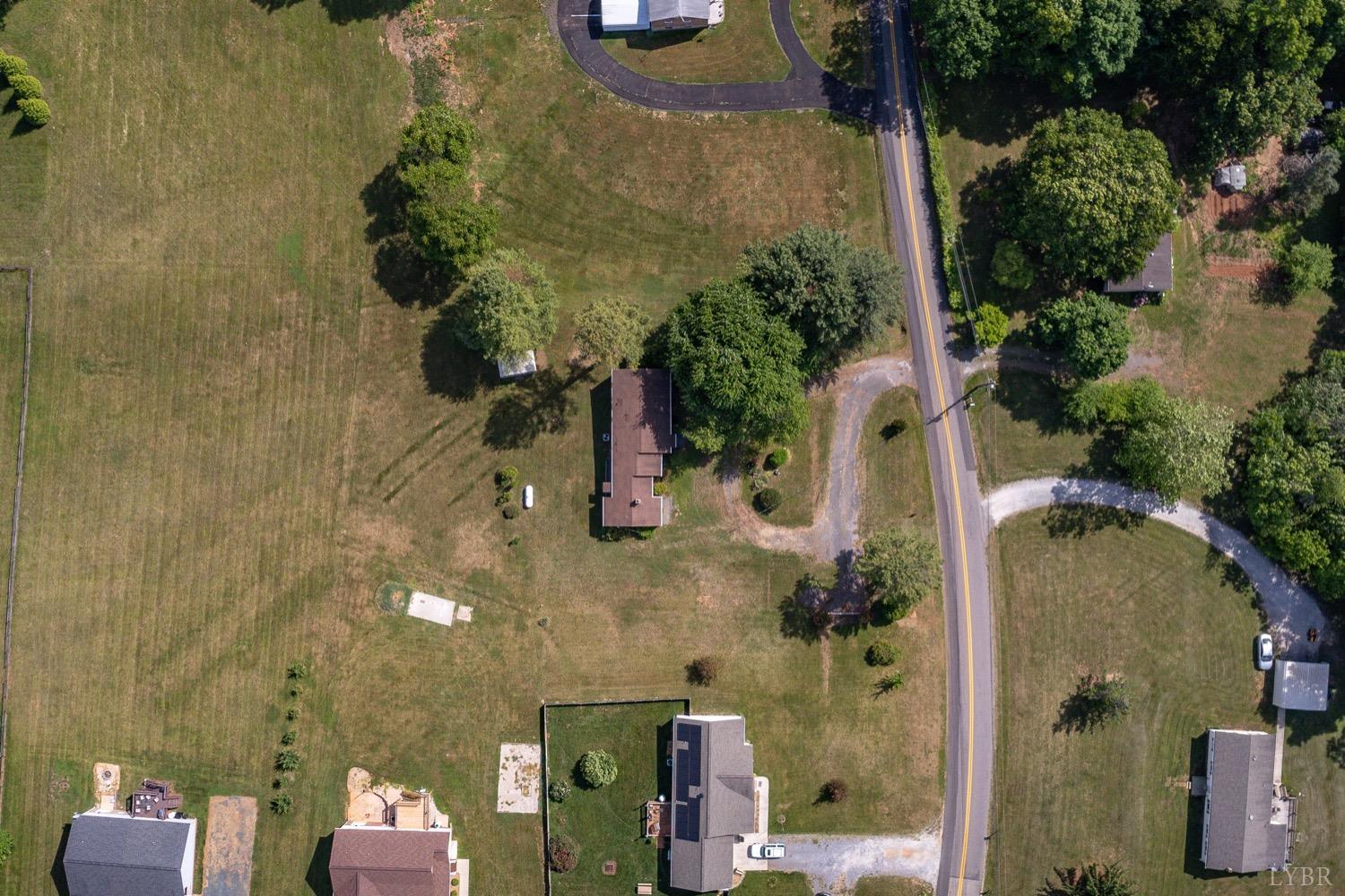 4794 Salem Road Spout Spring, VA 24593 - Photo 31 of 34 an aerial view of a house with a yard