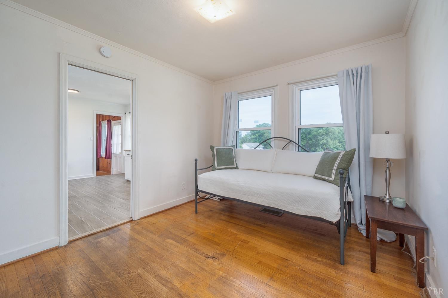 4794 Salem Road Spout Spring, VA 24593 - Photo 9 of 34 a spacious bedroom with a bed and a window