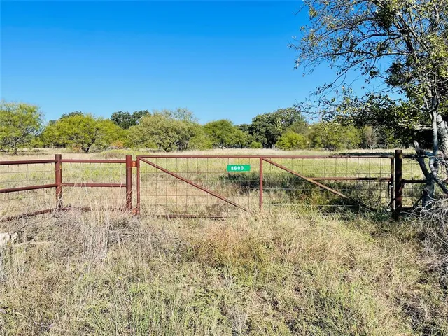 a view of a lake from a balcony