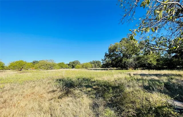 a view of beach and yard