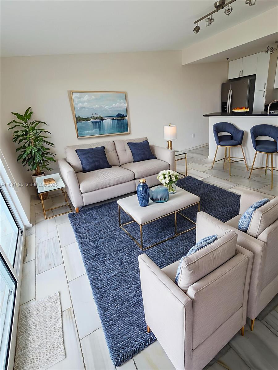 a living room with furniture and a couch