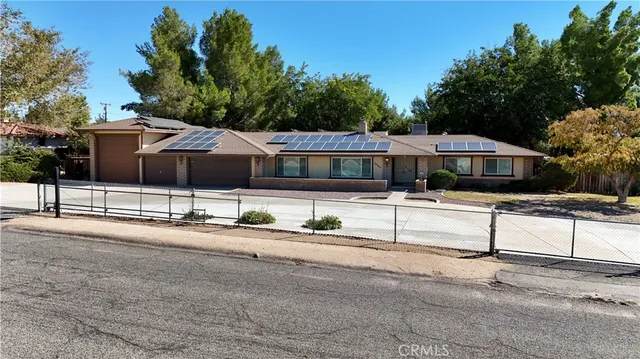a front view of a house with street