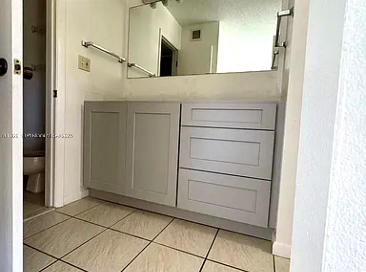 2941 Southwest 87th Avenue, Unit 406 Davie, FL 33328 - Photo 7 of 16 a view of a hallway