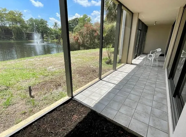 a view of swimming pool from a balcony