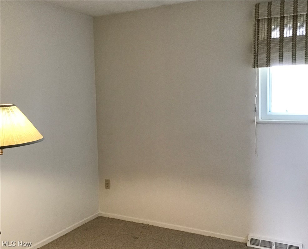 8947 West Ridge Road, Unit C Elyria, OH 44035 - Photo 17 of 27 3rd bedroom. Windows are vinyl clad.