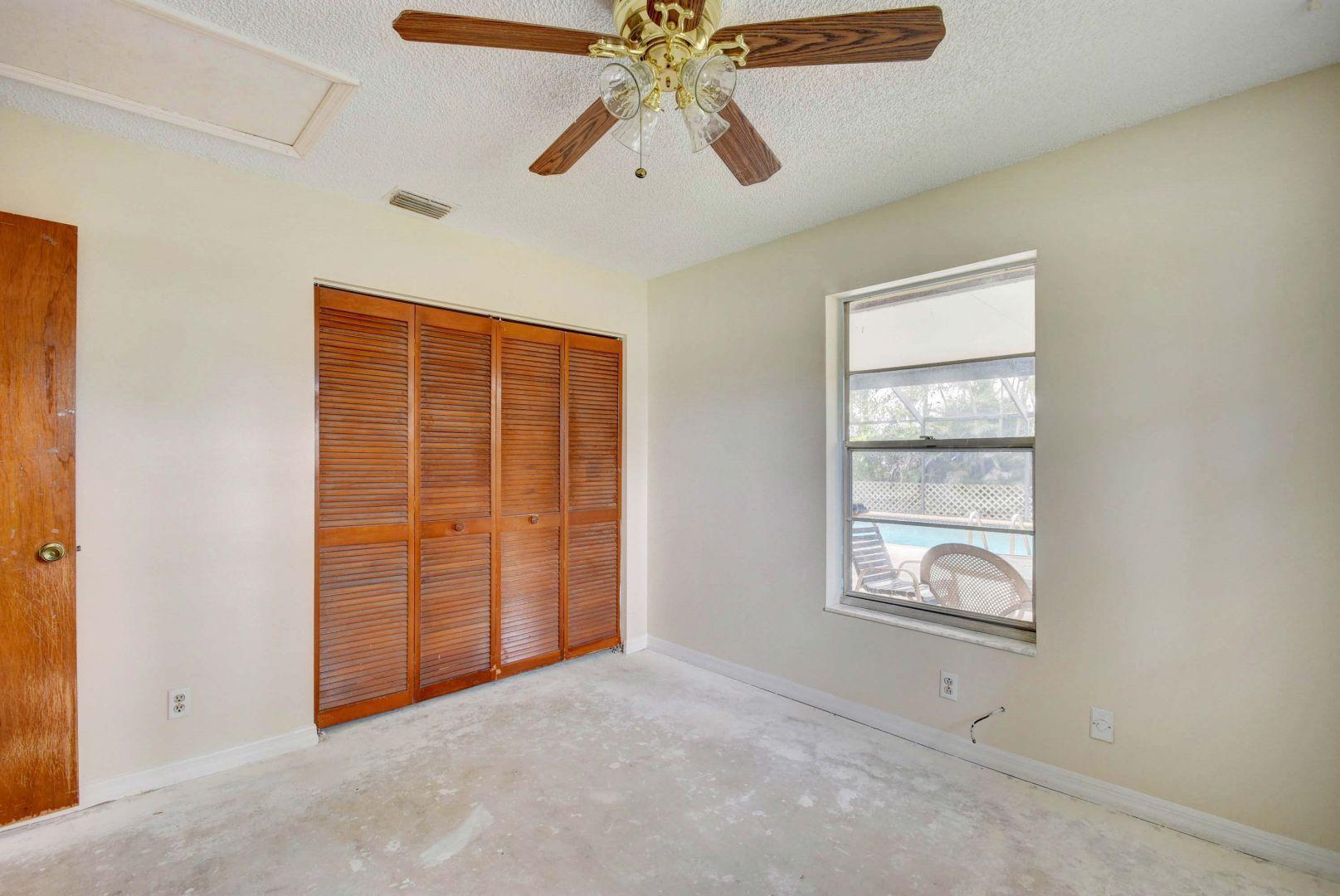 31 Barberton Road Lake Worth, FL 33467 - Photo 23 of 59 Guest Bedroom