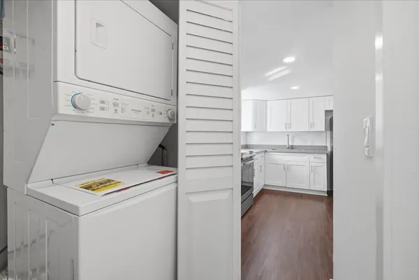 a utility room with washer and dryer