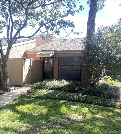 a view of a patio front of house