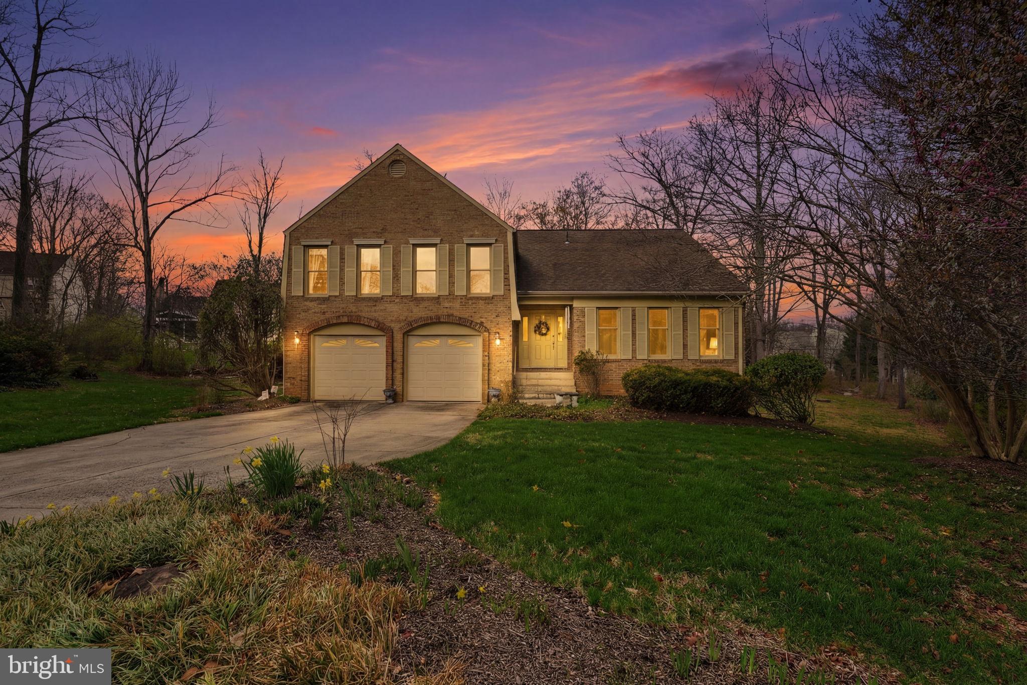 7 Wickham Court Sterling, VA 20165 - Photo 1 of 44 a front view of a house with yard and green space