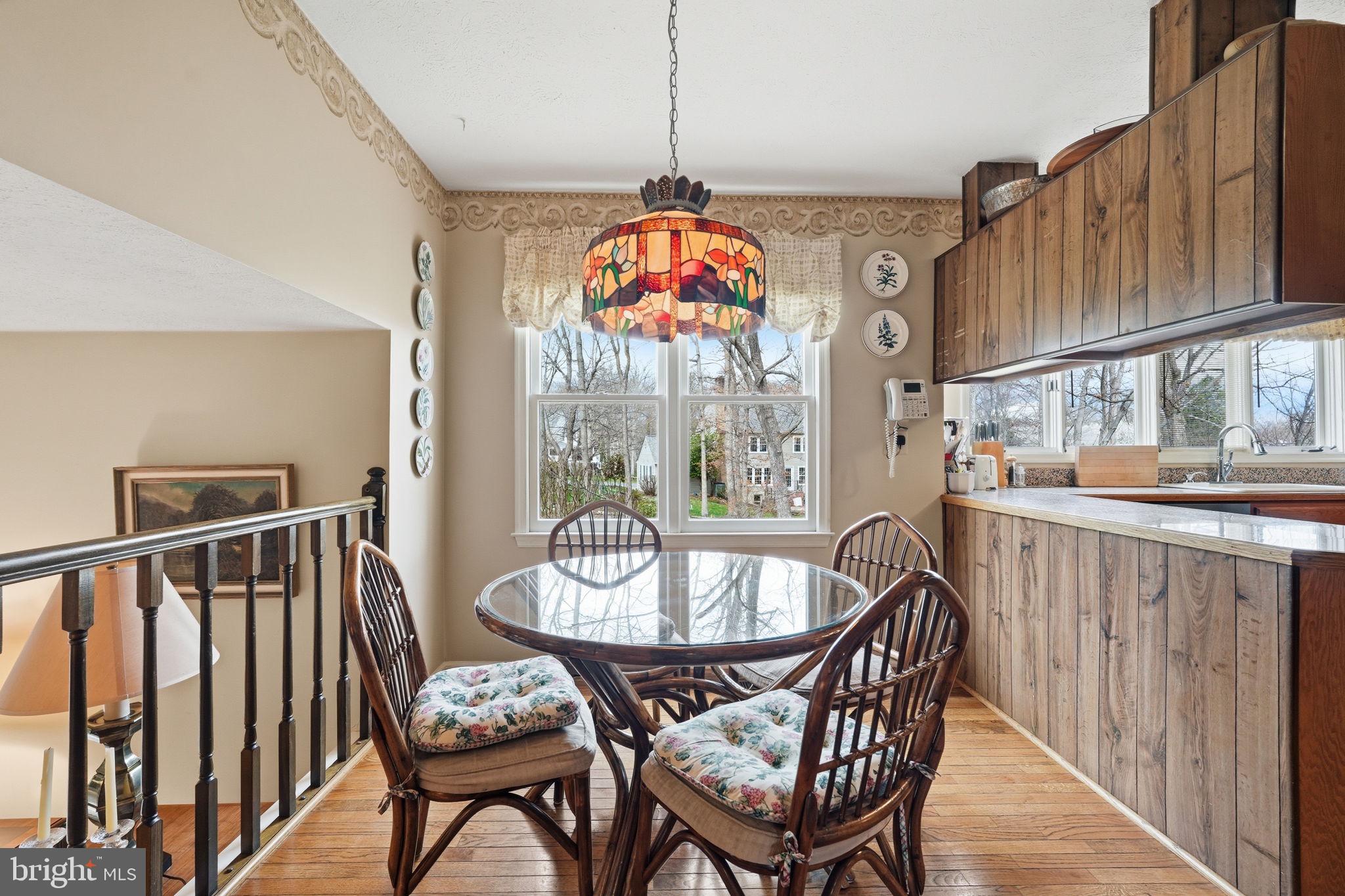 7 Wickham Court Sterling, VA 20165 - Photo 13 of 44 a view of a dining room with furniture window and wooden floor