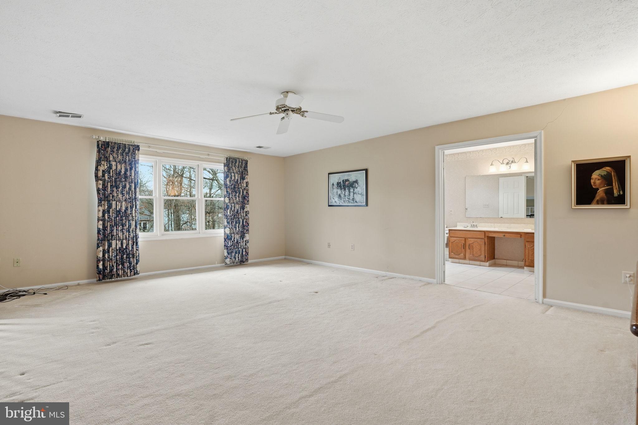 7 Wickham Court Sterling, VA 20165 - Photo 20 of 44 a view of an empty room with a window