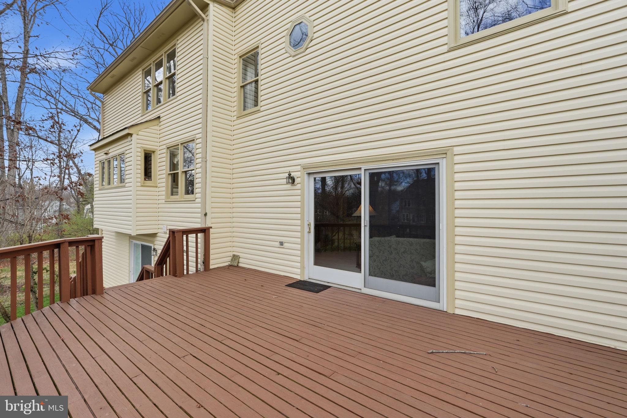 7 Wickham Court Sterling, VA 20165 - Photo 31 of 44 a view of a house with a deck