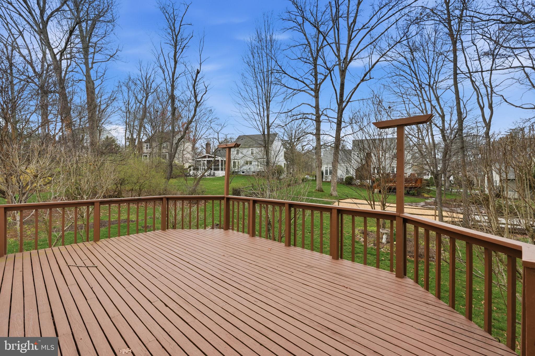 7 Wickham Court Sterling, VA 20165 - Photo 32 of 44 a balcony with wooden floor and fence