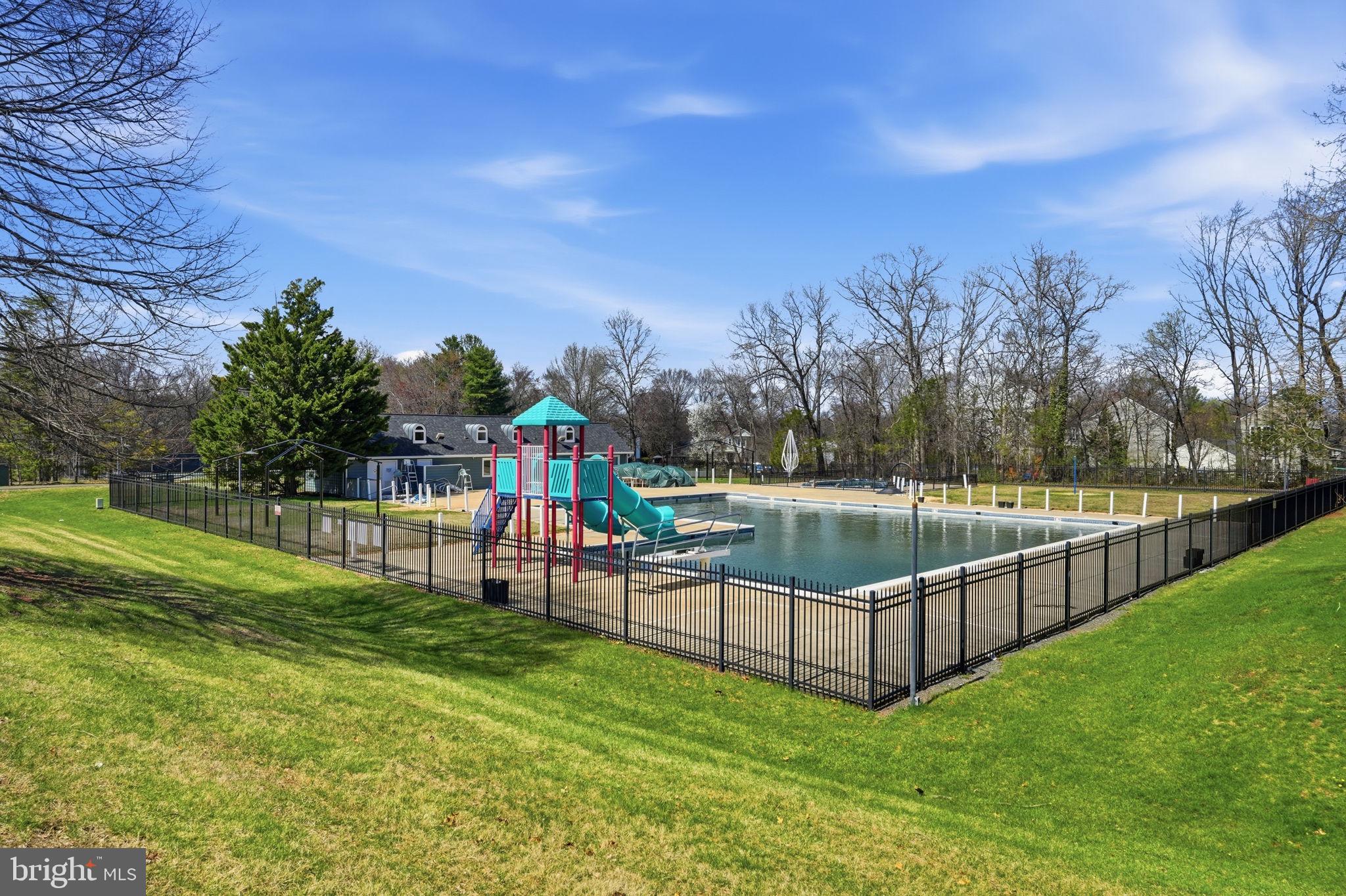 7 Wickham Court Sterling, VA 20165 - Photo 36 of 44 a view of a park with swings and slides