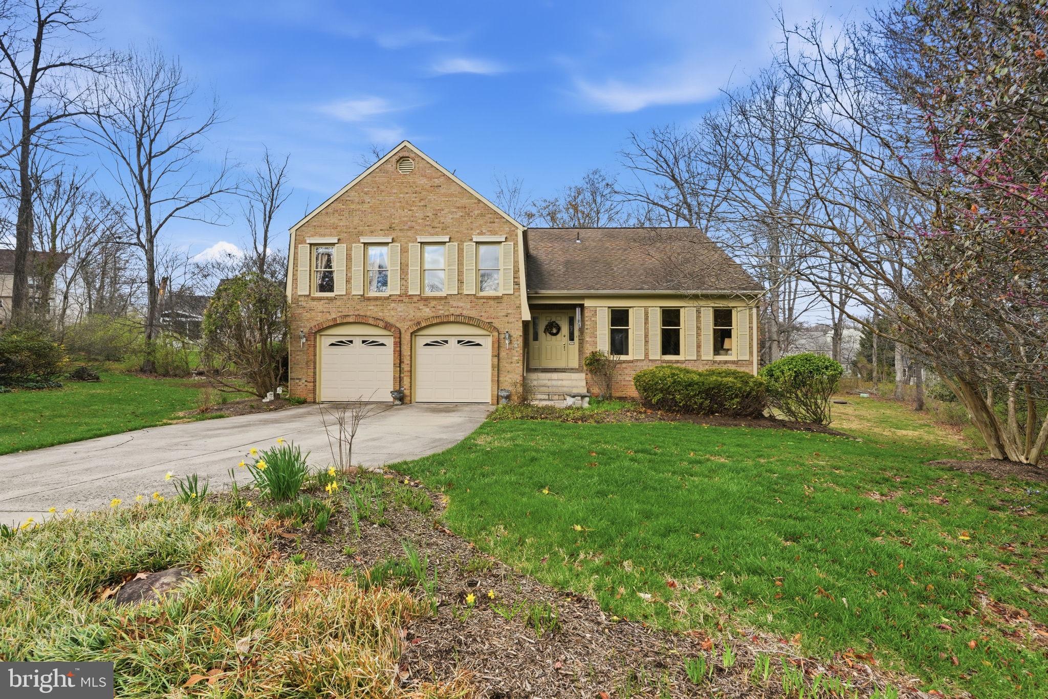 7 Wickham Court Sterling, VA 20165 - Photo 4 of 44 a front view of a house with a yard