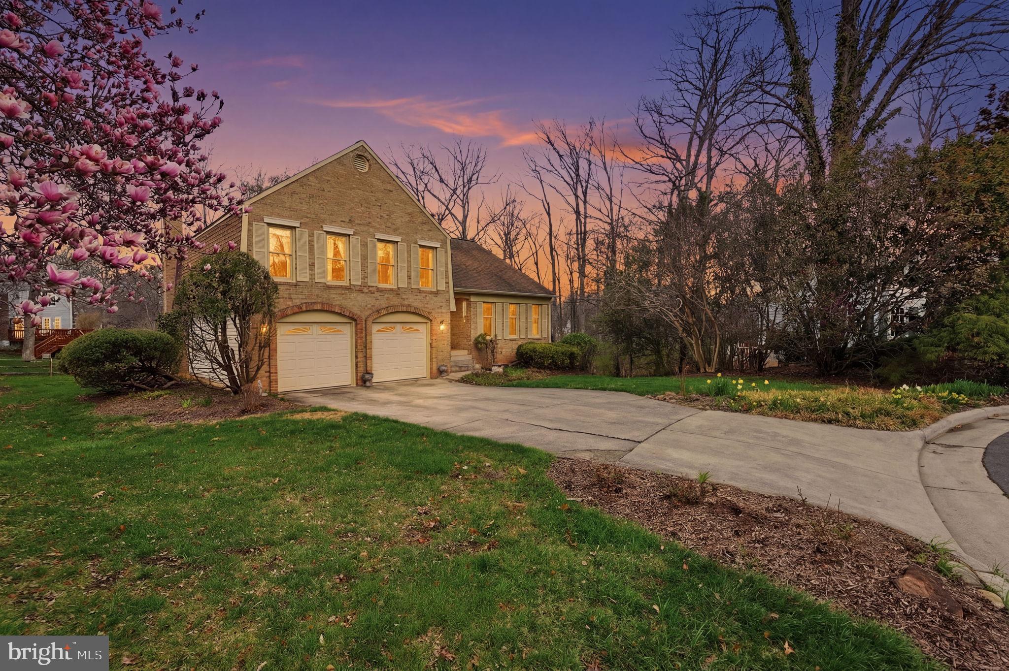 7 Wickham Court Sterling, VA 20165 - Photo 43 of 44 a view of a big house with a big yard and large trees