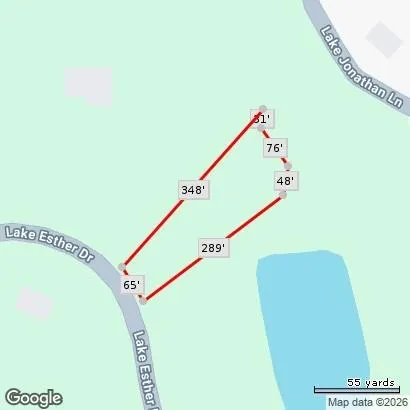 a view of a hallway with staircase