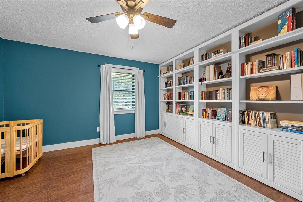 3000 North 15th A Street Waco, TX 76708 - Photo 16 of 24 a view of an empty room with a bookshelf