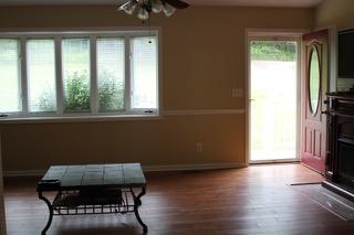 2575 Split Rail Road Shawsville, VA 24162 - Photo 4 of 25 a view of a room with furniture window and wooden floor
