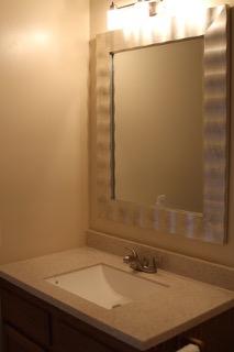 2575 Split Rail Road Shawsville, VA 24162 - Photo 10 of 25 a bathroom with a sink and a mirror