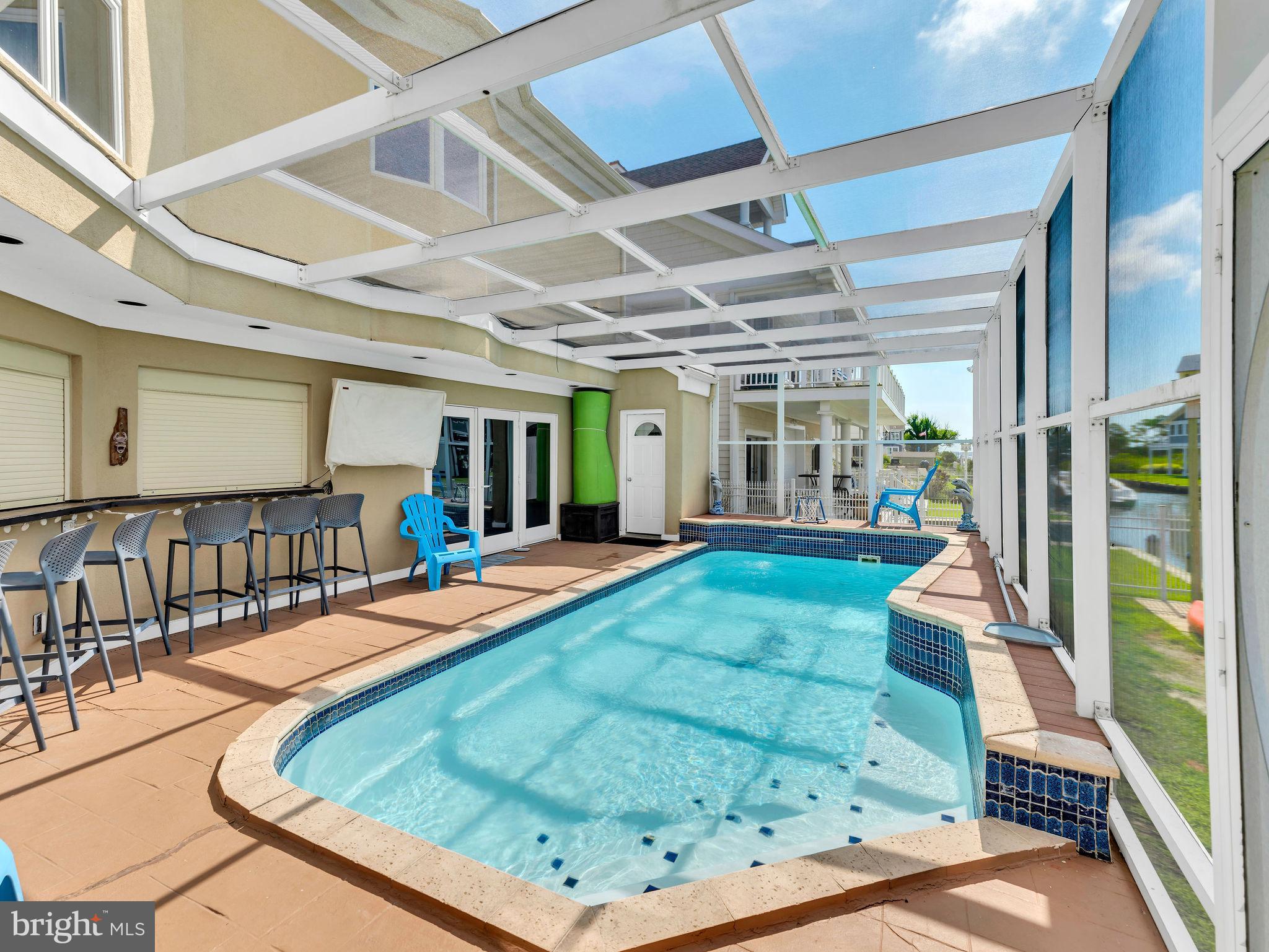 12608 Selsey Road Ocean City, MD 21842 - Photo 46 of 66 a view of a living room and bedroom